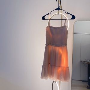 This dress is from aritzia still selling in stores … very comfortable and flowy